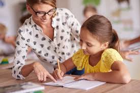 Woman teacher with a 12 year old student